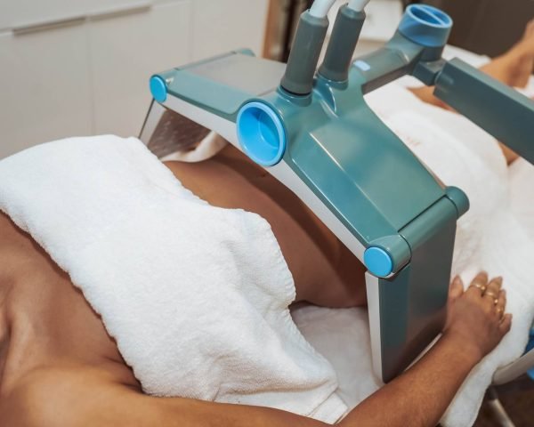A body contouring treatment in progress at Lilly Beauty